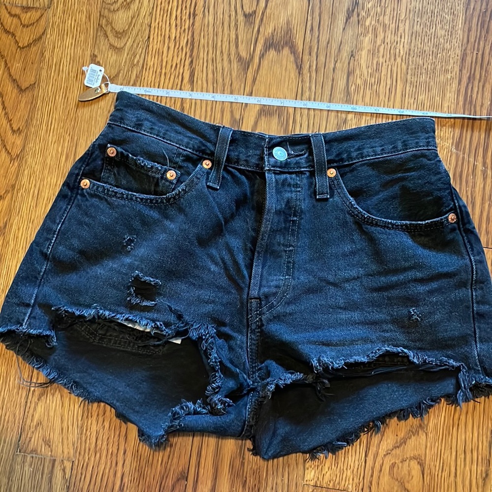 Black denim Levi’s 501 cutoff shorts